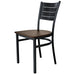 Tarrison Aria side chair with black metal frame, slotted back and dark walnut wood seat, angled front view