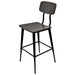 Tarrison Kate bar stool with black metal frame, footrest rungs, black seat and curved black backrest, angled view