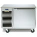 Traulsen TU044HT 44-inch single door stainless steel side mounted refrigerated work table on casters, angled view