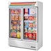 True GDM-49F-HC~TSL01 54-inch white double glass door display freezer stocked with frozen pizza and meals