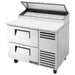 True TPP-AT-44-HC 44" pizza prep table in the two-drawer configuration, stainless steel with white cutting board