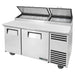 True TPP-AT-60-HC 60" two door stainless steel pizza prep table with split lids raised and white cutting board