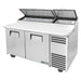 True TPP-AT-67-HC 67" two door stainless steel pizza prep table with split lids raised and white cutting board