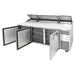 True TPP-AT2-93-HC 93" pizza prep table with all three doors open showing the refrigerated interior and shelves