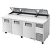 True TPP-AT2-93-HC 93" three door stainless steel pizza prep table with three lids raised and white cutting board