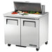 True TSSU-36-08-HC 36" two door stainless steel refrigerated sandwich prep table with lid open over toppings
