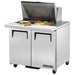 True TSSU-36-12M-B-HC 36" two door stainless steel mega top sandwich prep table with lid open over ingredients