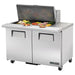 True TSSU-48-18M-B-HC 48" stainless steel mega top sandwich prep table with lid raised, angled right view