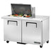 True TSSU-48-18M-B-HC 48" two door mega top sandwich prep table with lid open over ingredients, alternate angle