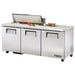 True TSSU-72-18-HC 72" three door stainless steel sandwich prep table with lid open, straight-on front view