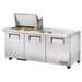 True TSSU-72-30M-B-ST-HC 72" three door mega top sandwich prep table with lid open over ingredients, alternate view