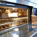 TurboChef HHD-9500-1 Double Batch high speed deck oven, close-up of the illuminated oven chamber through the glass