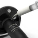UYAR D190 electric kebob knife, close-up of the sharpening stone being used on the blade near the motor head
