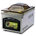VacMaster VP215 stainless steel countertop chamber vacuum sealing machine with tinted domed lid closed, angled view