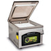 VacMaster VP230 chamber vacuum sealing machine with the lid open showing the chamber and white filler plate