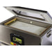 VacMaster VP330 chamber vacuum sealing machine with the lid open, close-up of the seal bar and filler plate