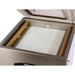 VacMaster VP540 chamber vacuum packaging machine, close-up of the chamber with white filler plate and dual seal bars
