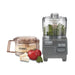 Waring WCG75 Pro Prep 3/4 quart chopper grinder chopping herbs, shown with grind bowl, tomato and garlic