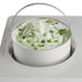 Waring WCIC20 2 quart ice cream maker, removable bowl with carry handle holding pistachio ice cream