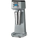 Waring WDM120TX single-spindle drink mixer with timer, grey housing and stainless steel cup, angled view