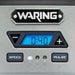 Waring WDM240TX double spindle drink mixer, close-up of the blue digital timer with speed and pulse buttons