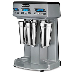 Waring WDM360TX triple spindle drink mixer with timer, grey housing and three stainless steel cups, angled