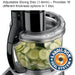 Waring WFP16SCD 4 quart food processor, adjustable slicing disc cutting cucumber slices into the clear bowl