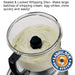 Waring WFP16SCD 4 quart food processor, sealed whipping disc whipping cream inside the clear bowl, close-up