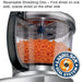 Waring WFP16SCD 4 quart food processor, reversible shredding disc shredding carrots into the clear bowl