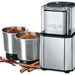 Waring WSG30 heavy duty spice grinder with two stainless steel bowls of ground spice and cinnamon sticks