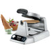 Waring WWCM180 single waffle cone maker with a cooked cone wafer beside waffle cones filled with ice cream