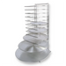 Winco 15 slot pizza rack shown loaded with pizza screens and pans stacked on the wire shelves
