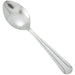 Winco Dominion stainless steel flatware, third spoon option with a rounded bowl and dot pattern handle, angled view