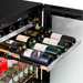 Wine Cell'r WC176BCSZ wine and beverage cooler with a wine rack pulled out holding bottles above can shelves