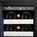 Wine Cell'r WC2743SSBC wine cooler, close-up of wine bottles on wood-trimmed racks below the digital display