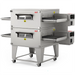 XLT 2440 Series compact conveyor ovens shown double-stacked on a stainless steel stand, front view with window
