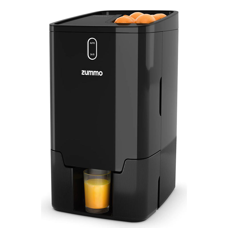 Zummo VIVA electric citrus juicer in black with oranges in the top feeder and a glass of juice under the spout