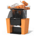 Zummo Z06-N electric citrus juicer with orange base, clear cover and oranges loaded in the top feeder basket