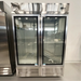Scratch and dent Nordic Air SGR-48C 54-inch double glass door stainless steel refrigerator, front view in the showroom