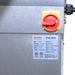 Alpha AVS-50 50 qt commercial spiral mixer, close-up of the red and yellow main power switch and spiral mixer plate