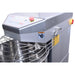Alpha AVS-60 60 qt commercial spiral mixer, close-up of the mixer head side, safety label and wire bowl guard