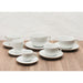 Ancap Verona white porcelain jumbo coffee cups and saucers set out on a wooden table with other cup sizes