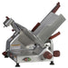 Berkel B14 manual aluminum meat slicer with 14-inch blade and red controls, angled left view of the carriage