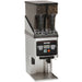 Bunn MHG-SS stainless steel funnel coffee grinder with two bean hoppers, LCD screen and batch buttons, angled view
