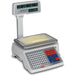 Detecto DL Series price computing scale with pole-mounted customer display, shown weighing a block of cheese