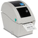 Detecto P225 thermal label printer, front view with lid closed and a printed thank you label exiting the slot