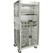 Equipex RE-2 electric rotisserie warmer shown under an RBE-25 chicken rotisserie as a stacked unit on casters
