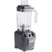 Hamilton Beach HBF510 Expeditor culinary blender/food processor, angled left view of the grey base and clear jar