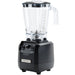 Hamilton Beach HBH550R Fury commercial blender, angled view of the empty 64 oz clear jar on the black base