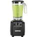 Hamilton Beach HBH550R Fury commercial blender with black base and 64 oz clear jar of green smoothie, front view